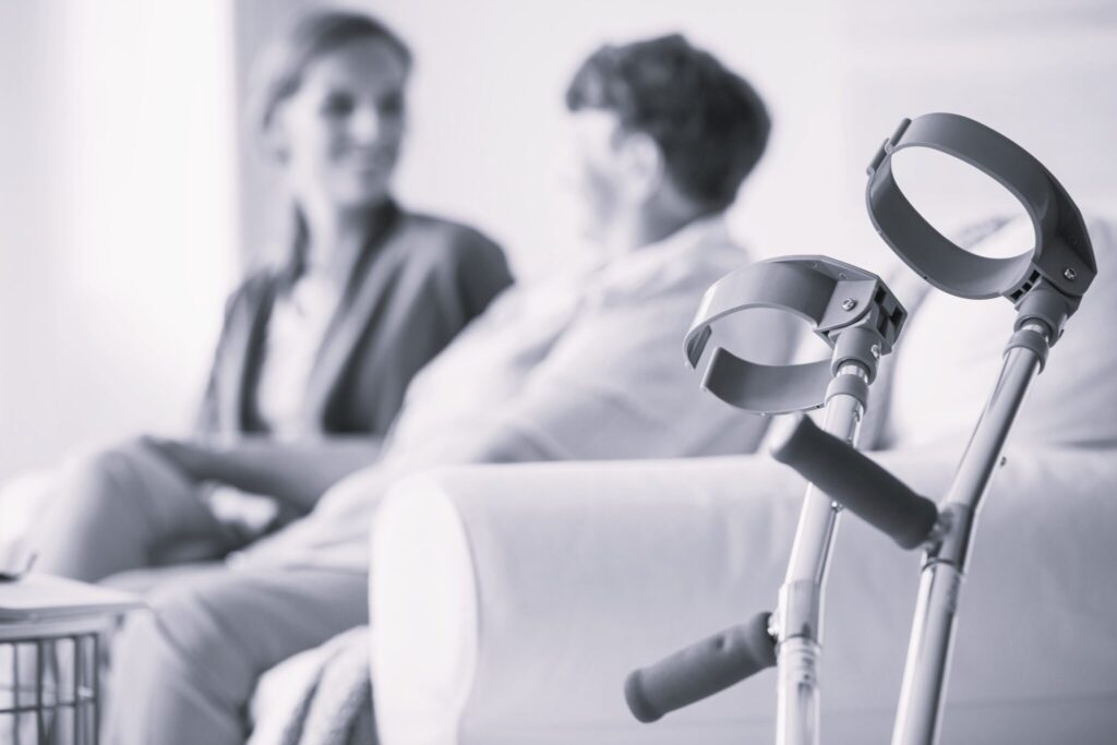 crutches-by-sofa-2021-08-27-11-05-05-utc-1-scaled-1