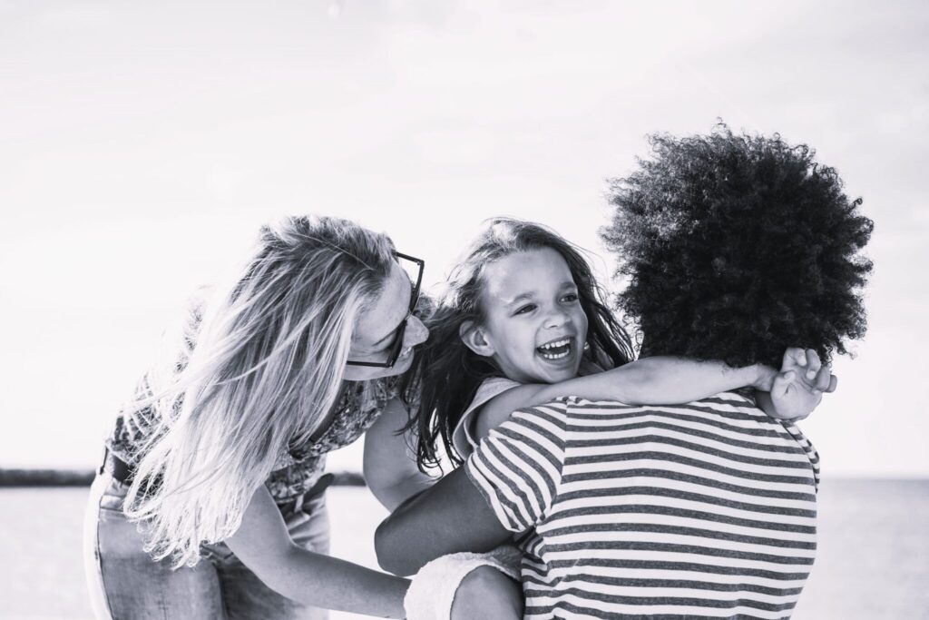 happy-family-having-fun-on-the-beach-2022-02-01-22-36-22-utc-1-scaled-1