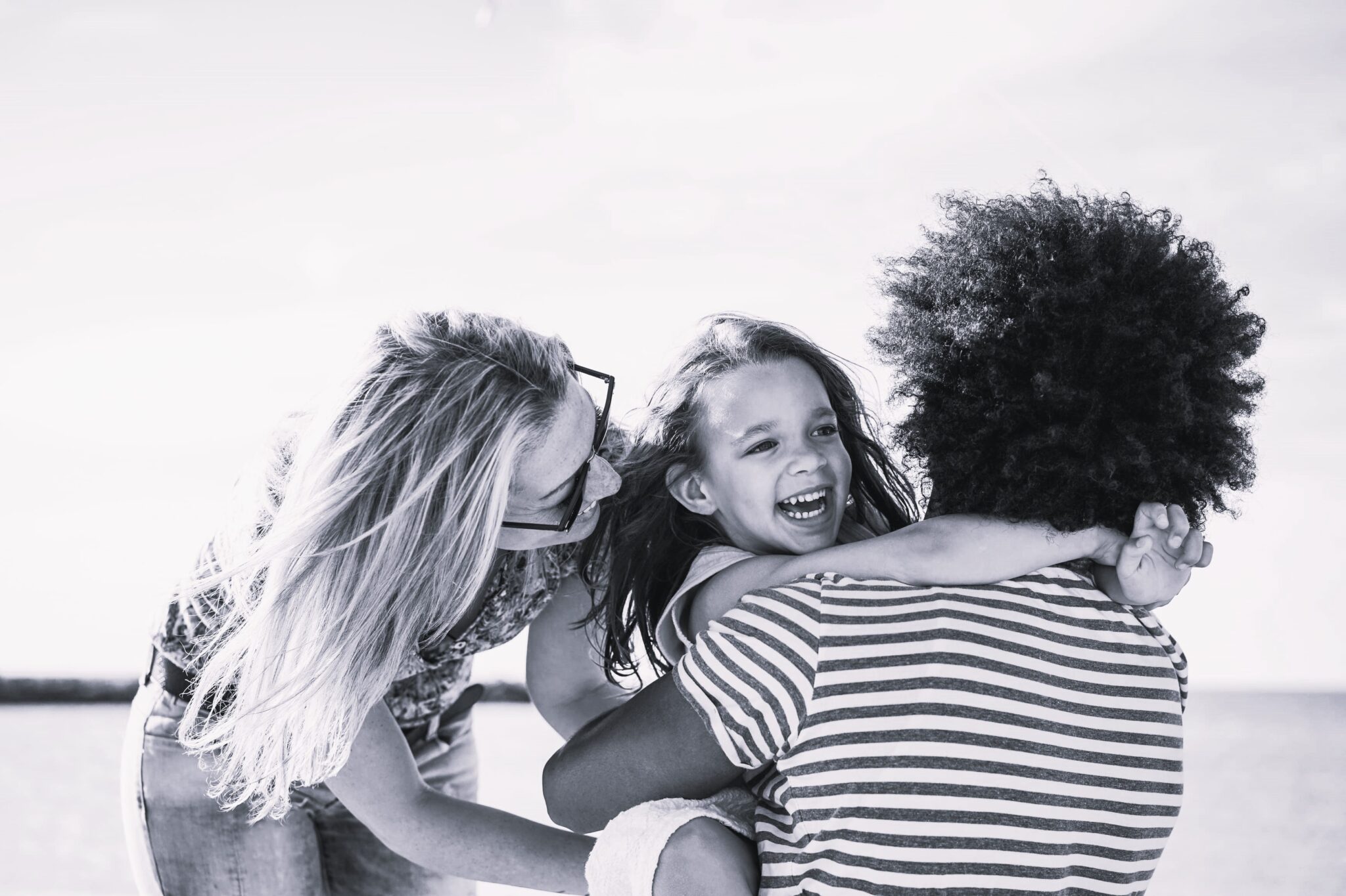 happy-family-having-fun-on-the-beach-2022-02-01-22-36-22-utc-1-scaled-1