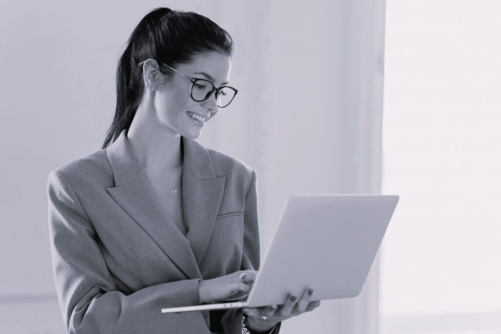 self-confident-cheerful-woman-economist-analyzes-r-2022-02-09-15-43-46-utc-1-scaled-1